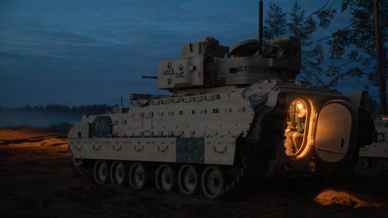 A U.S. M2A3 Bradley Infantry Fighting Vehicle assigned to 6th Squadron, 1st Cavalry Regiment, 1st Brigade Combat Team, 1st Armored Division, prepares to fire during Project Flytrap 5.0 at Pabradė Training Area, Lithuania, May 10, 2026. Project Flytrap is a counter-unmanned aerial system exercise designed to integrate emerging technologies and inform future Army requirements and doctrine. Project Flytrap integrates emerging technologies in a counter-unmanned aerial system exercise and informs future Army requirements and doctrine. From April 27 to May 31, 2026, U.S. and Allied forces will conduct Project Flytrap as part of a series of linked exercises, including Sword 26, Saber Strike, Immediate Response, and Swift Response, which transform experimentation into capability. During Project Flytrap, Soldiers integrate counter-unmanned systems, AI-enabled command and control, and live data networks to move, decide, and fight more effectively across all domains. (U.S. Army Reserve photo by Sgt. Joseph Honce)