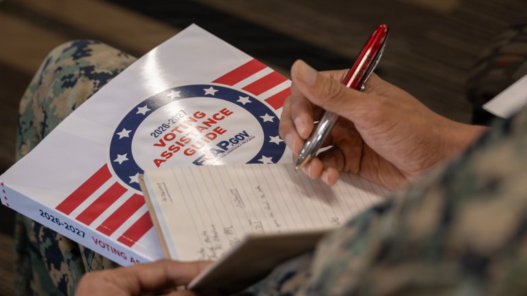 U.S. Marine Corps Cpl. Adrian Estrada, a combat videographer with Marine Corps Installations West, Marine Corps Base Camp Pendleton, takes notes during a voting assistance officer workshop at MCB Camp Pendleton, Calif., May 14, 2026. The workshop, held by the Federal Voting Assistance Program, aims to train and prepare voting assistance officers to help U.S. citizens and military members cast their absentee ballots in U.S. elections. (U.S. Marine Corps photo by Sgt. Dillon Buck) 