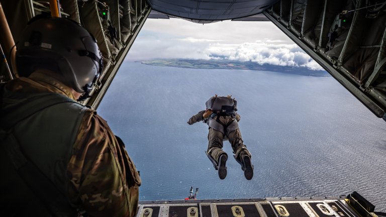 A U.S. Air Force pararescueman from the Kentucky Air National Guard’s 123rd Special Tactics Squadron jumps from a C-130J Super Hercules aircraft into the Atlantic Ocean off the coast of Scotland on Aug. 18, 2016. The Airman is conducting open-ocean rescue training with members of the Kentucky Guard’s 165th Airlift Squadron and the British Royal Navy’s 814 Naval Air Squadron. (U.S. Air National Guard photo by Dale Greer)