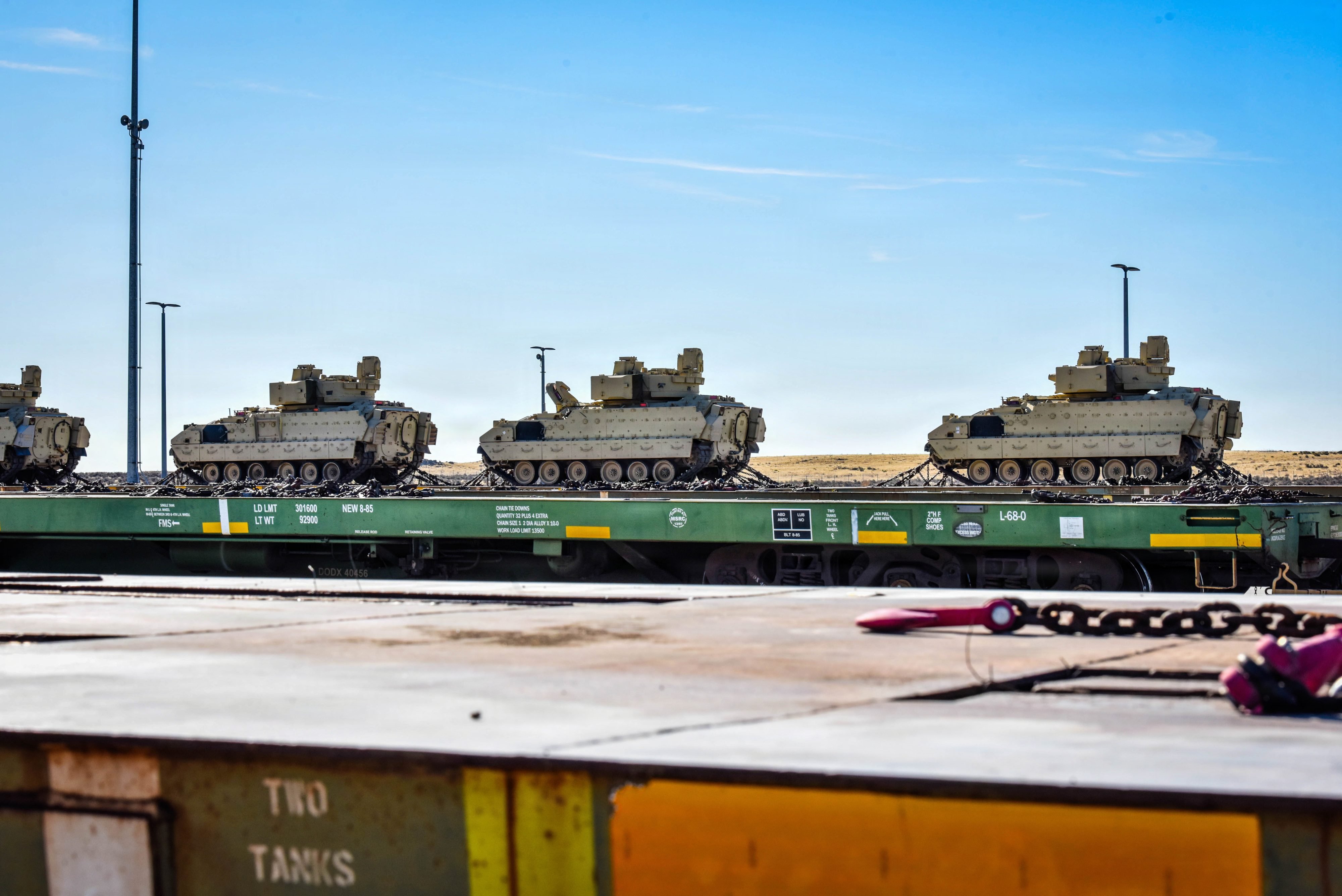 M2 Bradley Fighting Vehicles sit chained to railcars at Camp Orchard, Idaho, Sept. 29, 2026. The Bradleys were loaded for shipment to a depot in Texas for repairs following the 116th Cavalry Brigade Combat Team's transition from an armored brigade to a mobile infantry brigade under the Army Transformation Initiative. The move followed the June 18, 2026, reorganization of the 2nd Battalion, 116th Cavalry Regiment, from a combined arms battalion to a mobile infantry battalion. (U.S. Army National Guard photo by Sgt. Rusty Rehl)