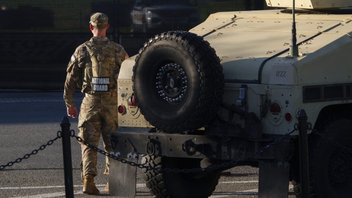WASHINGTON, DC - JUNE 3: A member of the National Guard stands next to a Humvee on the National Mall overlooking the White House on June 3, 2026 in Washington, DC. (Photo by Kevin Carter/Getty Images)